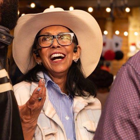 Guest laughing at an event